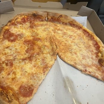 Capriccios Italian Restaurant - Large Pizza Pie with Extra Cheese and half Pepperoni. - Italian Near Me - Richmond, Virginia Capriccios Italian Restaurant - Large Pizza Pie with Extra Cheese and half Pepperoni. - Italian Near Me - Richmond, Virginia
