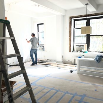 NYC A1 Home Improvement - a man standing in the middle of a room - General Contractors Near Me - Brooklyn, New York NYC A1 Home Improvement - a man standing in the middle of a room - General Contractors Near Me - Brooklyn, New York