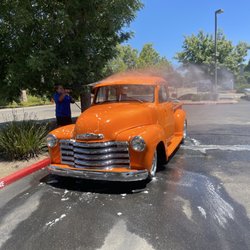 Splasherville Car Wash & Lube Express - Hand washing old school truck