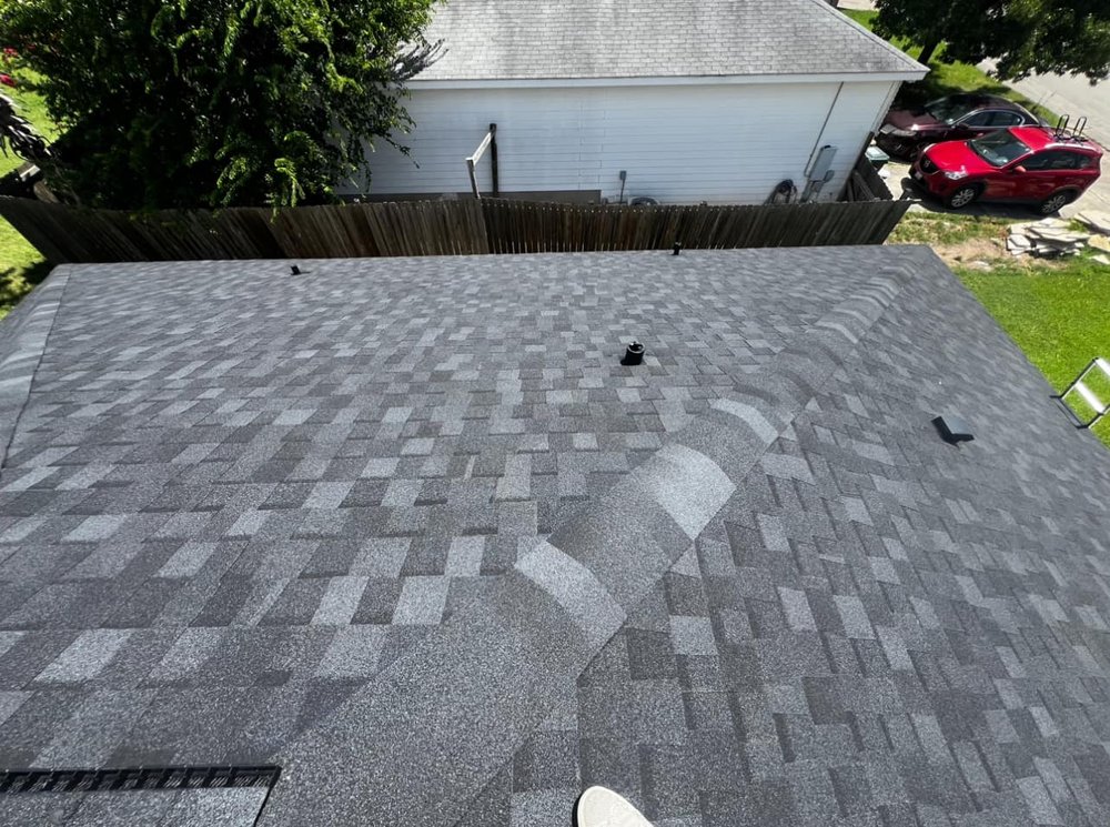 Slide of Greyhound Roofing