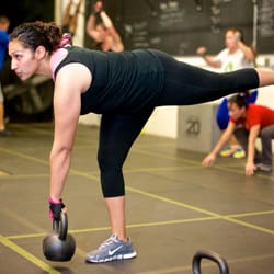 Kandu Fitness - Monica finishing off a workout with X-Over Deads.