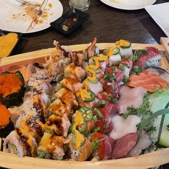 Sushi Haya - from left to right: masago, shaggy dog, double dragon, new surf & turf, kiss of fire, assorted sashimi - Sushi Bars Near Me - Spring, Texas Sushi Haya - from left to right: masago, shaggy dog, double dragon, new surf & turf, kiss of fire, assorted sashimi - Sushi Bars Near Me - Spring, Texas