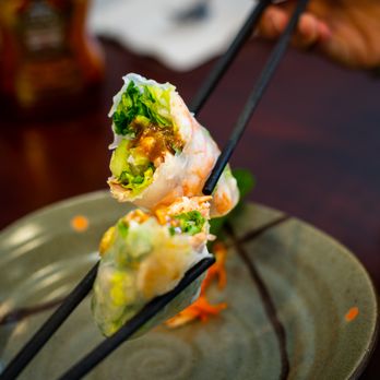 VinBun Vietnamese Bistro - a plate of food with chopsticks - Vietnamese Near Me - Middletown, Kentucky VinBun Vietnamese Bistro - a plate of food with chopsticks - Vietnamese Near Me - Middletown, Kentucky