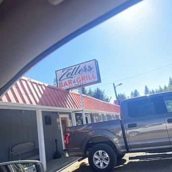 Zeller’s Riverside Bar & Grill - a truck parked in front of a restaurant - Bars Near Me - Otis, Oregon