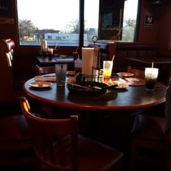Pizza Hut - Dirty tables everywhere. People standing in line at the payout counter just to get a drink refill. Sewer smell. Understaffed!!