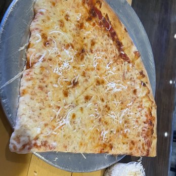 Trident Pizza Pub - Cheese slice for lunch special with fresh grated parmigiana - Pizza Near Me - Tucson, Arizona Trident Pizza Pub - Cheese slice for lunch special with fresh grated parmigiana - Pizza Near Me - Tucson, Arizona
