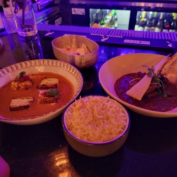Feringhee - Modern Indian Cuisine - paneer on the left (amazing), garlic Naan (so hot and delicious) , lamb curry (very tender meat, earthy and spicy, and saffron rice - Indian Near Me - Chandler, Arizona