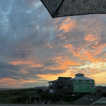 Crab's Claw Oceanfront Caribbean Restaurant - Sunset from top deck - Seafood Near Me - Atlantic Beach, North Carolina Crab's Claw Oceanfront Caribbean Restaurant - Sunset from top deck - Seafood Near Me - Atlantic Beach, North Carolina