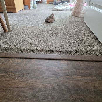 50Floor - Damaged transition strips because of poor workmanship. - Flooring Near Me - North Charleston, South Carolina