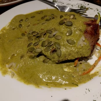 Restaurant Mole Del Rey - Veal with mole verde. Mole has pumpkin seeds in it. Served on a bed of white rice, peas, and julienned carrots. - Mexican Near Me - Bell, California Restaurant Mole Del Rey - Veal with mole verde. Mole has pumpkin seeds in it. Served on a bed of white rice, peas, and julienned carrots. - Mexican Near Me - Bell, California