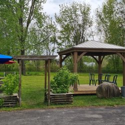 DQ Grill & Chill Restaurant - Outside wooden gazebo