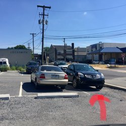 Parking Lot across from Amtrak - No concrete stop because his is not a parking space.