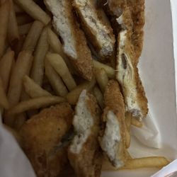 Crown Fried Chicken - Chicken fingers - mostly filler, spongy and tasteless. The fries were fired right but again, no salt.