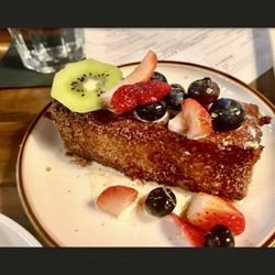 Spain Wine Bar - French toast topped with fruit brunch menu ... the bread of French toast is insanely good