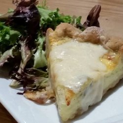 Breaking Grounds Cafe - Quiche with lightly dressed mixed greens.