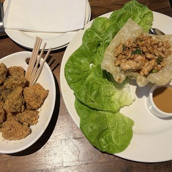 Yard House - Boneless Wings (lemon pepper seasoning) and Chicken Lettuce Wraps - Bars Near Me - East Rutherford, New Jersey Yard House - Boneless Wings (lemon pepper seasoning) and Chicken Lettuce Wraps - Bars Near Me - East Rutherford, New Jersey