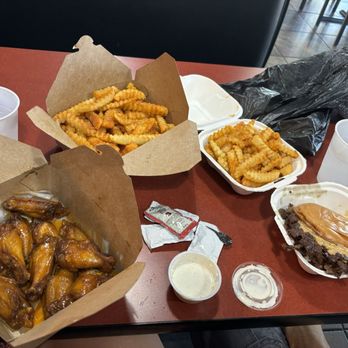 Cow & Cheese - 10pc Real Hot Buffalo Wing Combo and Triple Smashburger with the secret rub fries - Burgers Near Me - Winter Park, Florida Cow & Cheese - 10pc Real Hot Buffalo Wing Combo and Triple Smashburger with the secret rub fries - Burgers Near Me - Winter Park, Florida
