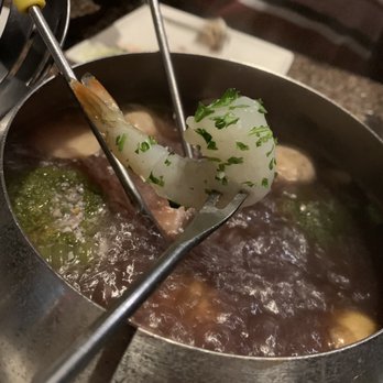 The Melting Pot - Shrimp going in... - Fondue Near Me - Raleigh, North Carolina