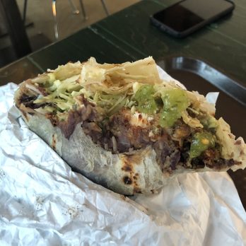 Tacofino - There is no aesthetic way to take a picture of a burrito, but you have to appreciate the layering technique for the perfect bite. - Mexican Near Me - Victoria, British Columbia Tacofino - There is no aesthetic way to take a picture of a burrito, but you have to appreciate the layering technique for the perfect bite. - Mexican Near Me - Victoria, British Columbia