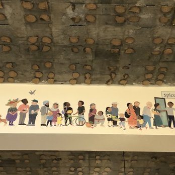 Spice Waala - a group of people on a wall - Indian Near Me - Seattle, Washington