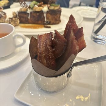 Ponte Modern American - Candied back and French toast in the background - New American Near Me - Tampa, Florida Ponte Modern American - Candied back and French toast in the background - New American Near Me - Tampa, Florida