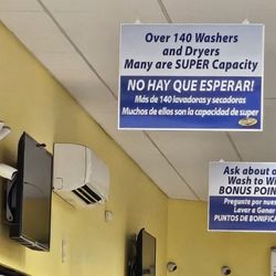 Sparkle Clean Laundromat - Sign and non working TV