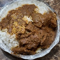 Quisqueya’s Restaurant - Bistec en salsa (stewed steak in sauce)