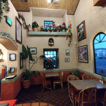 Casa De Oro - a dining area with tables and chairs - Mexican Near Me - Spokane, Washington