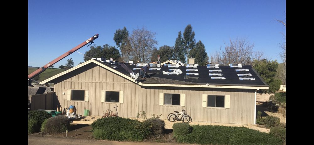 Slide of Riparetti Roofing