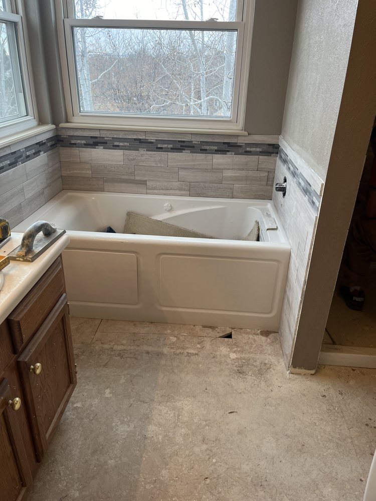 Slide of MKV Custom Remodels