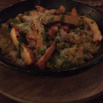 Taberna Tapas - I decided to forgo the multitude of tapas options and decided to order their chicken paella instead. - Spanish Near Me - Durham, North Carolina