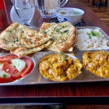 5 Rivers Indian Cuisine - Non-Veg Thali, the lamb and chicken curries were both so flavorful and their naan is amazing. - Indian Near Me - Everett, Washington