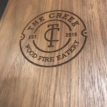 The Creek Eatery - Love the wooden menus - Wine Bars Near Me - San Jose, California The Creek Eatery - Love the wooden menus - Wine Bars Near Me - San Jose, California