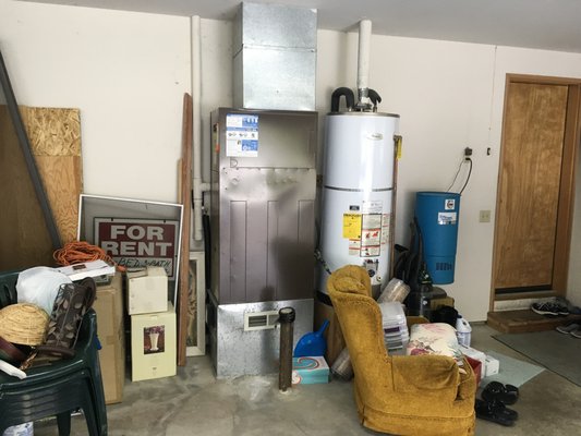 Green Furnace Install- Before and after pictures Oriental Ave. - Another clean project where we had a 16 year old water heater and Furnace and replaced them both in one shot with the GF200 combi-furnace. The world's only tankless water heater and most efficient furnace in one! This money saving products provides all your hot water and heating for the entire year for under $200 and Cascade Natural Gas company pays an instant $1,550 towards the cost! That makes the price for this water heater and furnace combo less than $12,000 for the entire install!