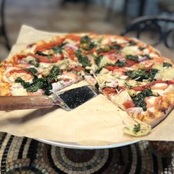 Fugazzeta Pizza & Empanadas - Large Primavera - (Vegetarian) Artichokes, Roasted Red Peppers, Onions, Fresh Tomato, Basil, Spinach
