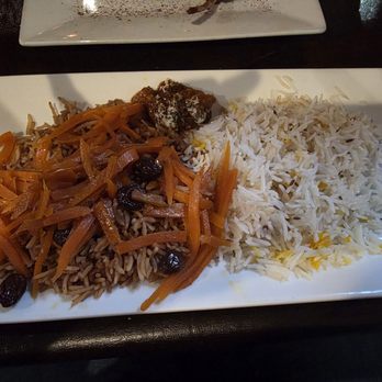 Aracosia McLean - Starting plate that comes with the meal, each person getting their own. Rice and then rice with sweet carrot rivers and raisins. - Afghan Near Me - McLean, Virginia Aracosia McLean - Starting plate that comes with the meal, each person getting their own. Rice and then rice with sweet carrot rivers and raisins. - Afghan Near Me - McLean, Virginia