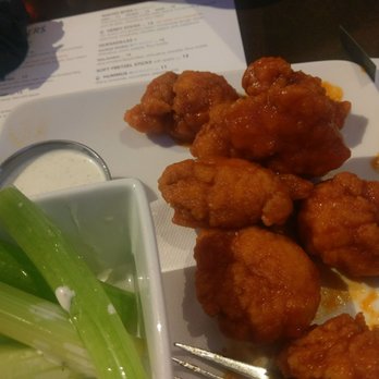 Theory - Boneless wings in a honey siracha sauce. Spicy! - Sports Bars Near Me - Chicago, Illinois