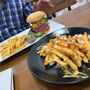 Pucker Up Vegan Eatery - Trash fries with chicken sandwich - Vegan Near Me - Cocoa, Florida Pucker Up Vegan Eatery - Trash fries with chicken sandwich - Vegan Near Me - Cocoa, Florida