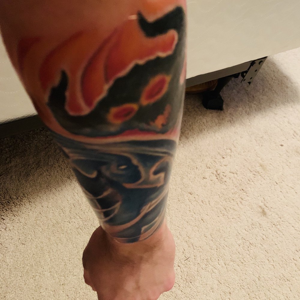 Fluid Ink - Tat #3 Warrior fighting demon half sleeve, top of forearm - Tattoo Near Me - Arlington, Virginia