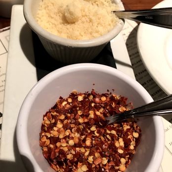 Siena Cafe - Side Parmesan & red pepper flakes - Italian Near Me - New York, New York Siena Cafe - Side Parmesan & red pepper flakes - Italian Near Me - New York, New York