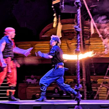 Pirates Dinner Adventure - Some of PDA's excellent stage fighting (with fire!!). - American Near Me - Buena Park, California Pirates Dinner Adventure - Some of PDA's excellent stage fighting (with fire!!). - American Near Me - Buena Park, California