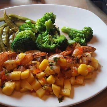 Bonefish Grill - Wood-grilled shrimp skewers on mango salsa with steamed broccoli and snow peas - Seafood Near Me - Las Vegas, Nevada