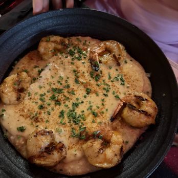 Lov3 Houston - Shrimp and grits with added sauce - Cocktail Bars Near Me - Houston, Texas Lov3 Houston - Shrimp and grits with added sauce - Cocktail Bars Near Me - Houston, Texas