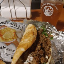 Perrylodgic Brewing - Chicken and pork Greek pita sandwich! house made tzatziki sauce, turkey and chicken garden vegetables, baby spinach, all wrapped pita!