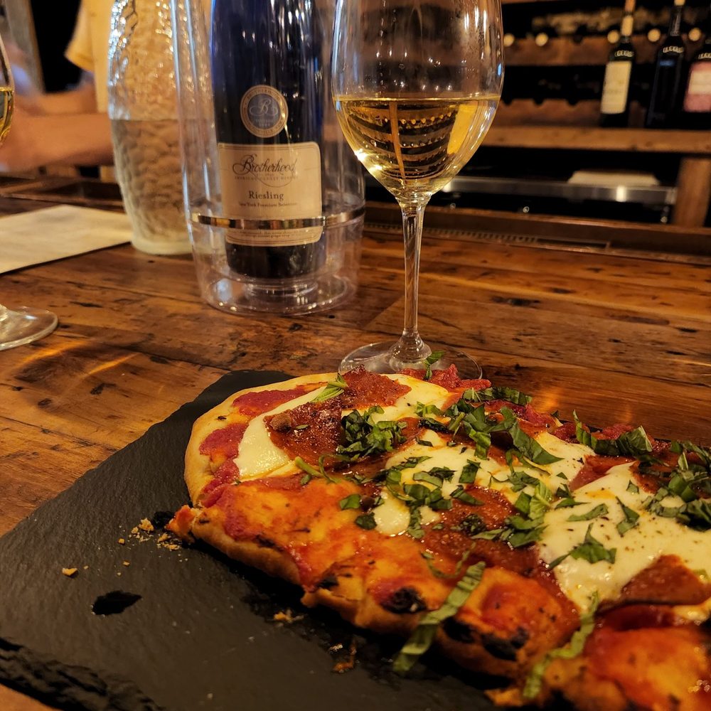 Taste Wine Room - a pizza and a glass of wine - Wine Bars Near Me - Augusta, Georgia