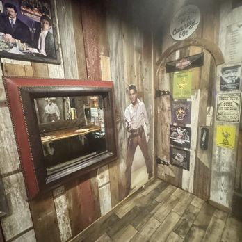 Doc Holliday's Roadhouse - Men's room. Elvis scared me because I wasn't expecting someone behind the door. - Bars Near Me - Billings, Montana Doc Holliday's Roadhouse - Men's room. Elvis scared me because I wasn't expecting someone behind the door. - Bars Near Me - Billings, Montana