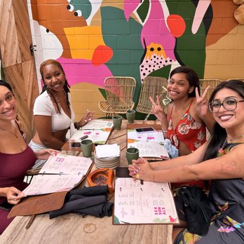 Wild - Ladies vining on the patio - Coffee & Tea Near Me - Houston, Texas Wild - Ladies vining on the patio - Coffee & Tea Near Me - Houston, Texas