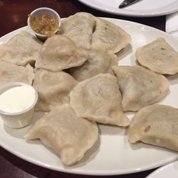 Café Polonez - Perogies or dumplings. Variety of flavors to choose from. This is mushroom and cheese. - Polish Near Me - Toronto, Ontario Café Polonez - Perogies or dumplings. Variety of flavors to choose from. This is mushroom and cheese. - Polish Near Me - Toronto, Ontario