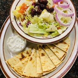 George's Bar and Grill - Greek salad with tzatziki sauce and pita bread!