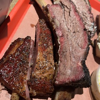 Terry Black's Barbecue - Pork ribs and a beef rib - Barbeque Near Me - Houston, Texas